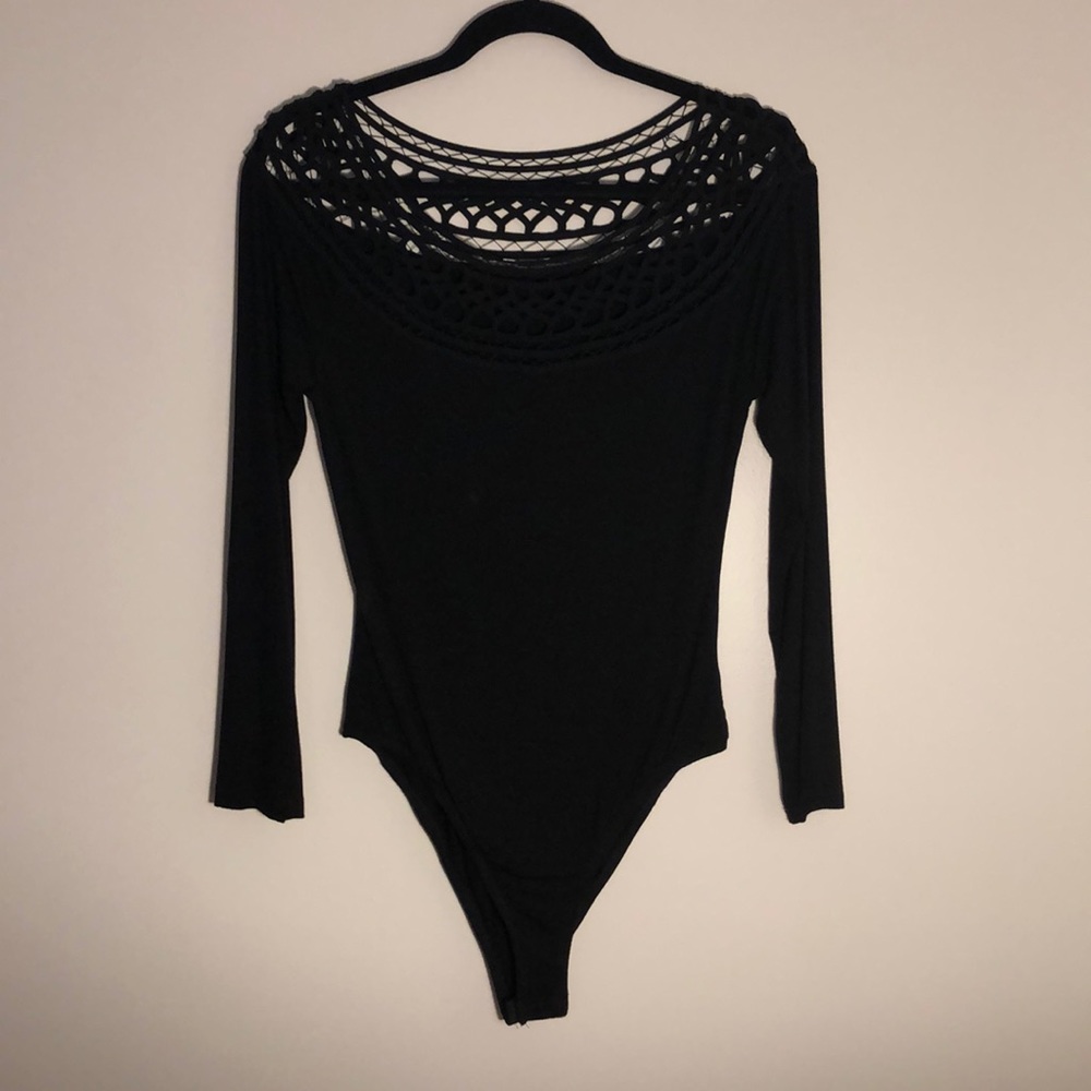 Black bodysuit , never worn before